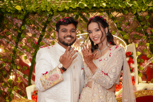 Bride and groom posing in traditional outfits after wedding ceremony